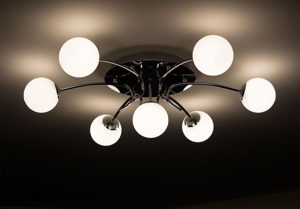 A ceiling light with six lights on it.